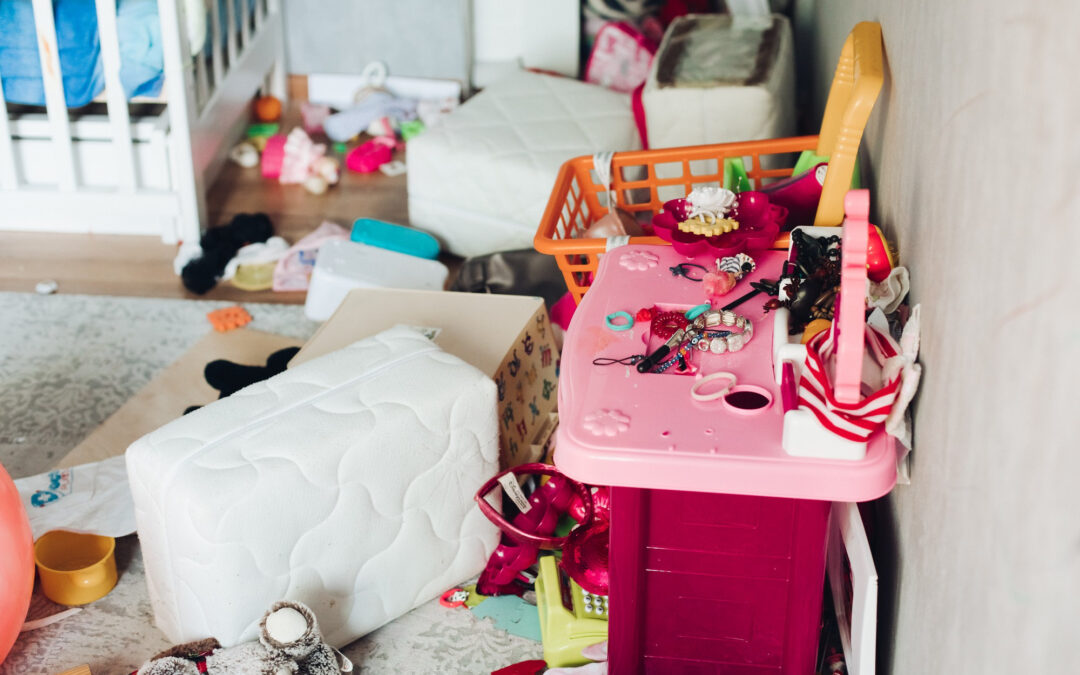 children s room with scattered things toys